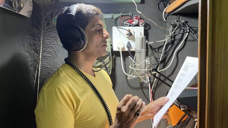 Avdhesh Tondak recording a voice over in his studio